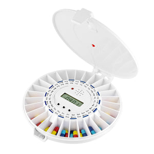 Automatic Pill Dispenser open showing an alarm, multiple compartments and various coloured pills inside